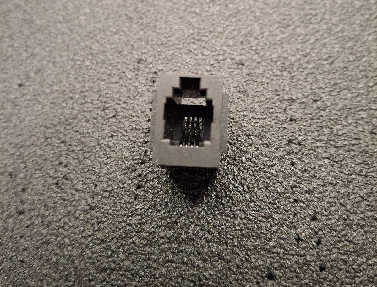 Modular-Einbaubuchse RJ10 – 4 Kontakte, 4 belegt schwarz